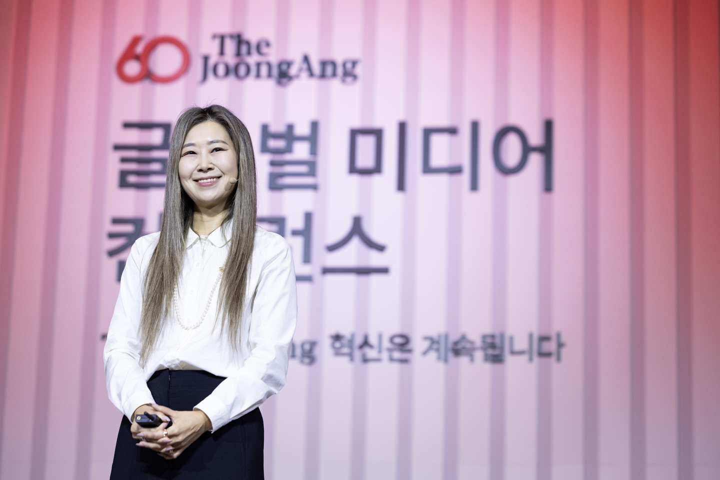 Maggie Kang, director of ″KPop Demon Hunters,″ speaks during the JoongAng 60th Anniversary Global Media Conference held at the Lotte Hotel in central Seoul on Sept. 18. [JOONGANG ILBO]