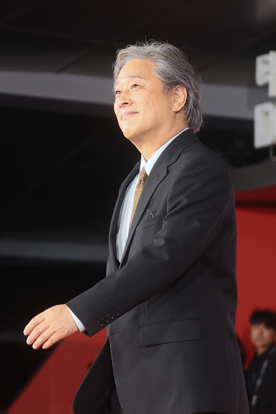 Director Park Chan-wook of ″No Other Choice″ arrives at the red carpet for the opening ceremony of the Busan International Film Festival at the Busan Cinema Center in Haeundae District, Busan, on Sept. 17. [YONHAP] 