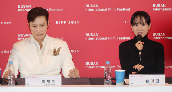 Actor Lee Byung-hun, left, and actor Son Ye-jin, at a press conference for director Park Chan-wook's film "No Other Choice," the opener for the Busan International Film Festival, held at the Busan Cinema Center in Haeundae District, Busan, on Sept. 17 [SONG BONG-GEUN]