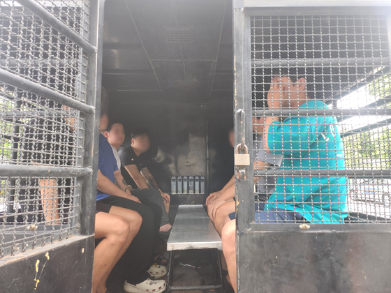 Fraud ring members on the run in Thailand are taken into custody. [SEOUL METROPOLITAN POLICE]