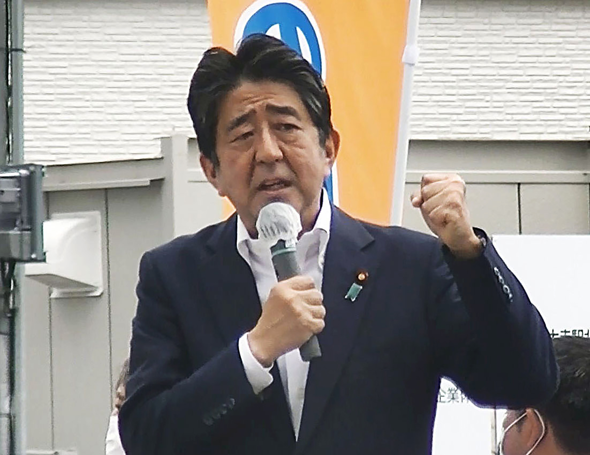 In this image from a video, Japan’s former Prime Minister Shinzo Abe makes a campaign speech in Nara, western Japan shortly before he was shot Friday, July 8, 2022. Abe was shot during the speech and was airlifted to a hospital but he was not breathing and his heart had stopped, officials said. [KYODO/YONHAP]