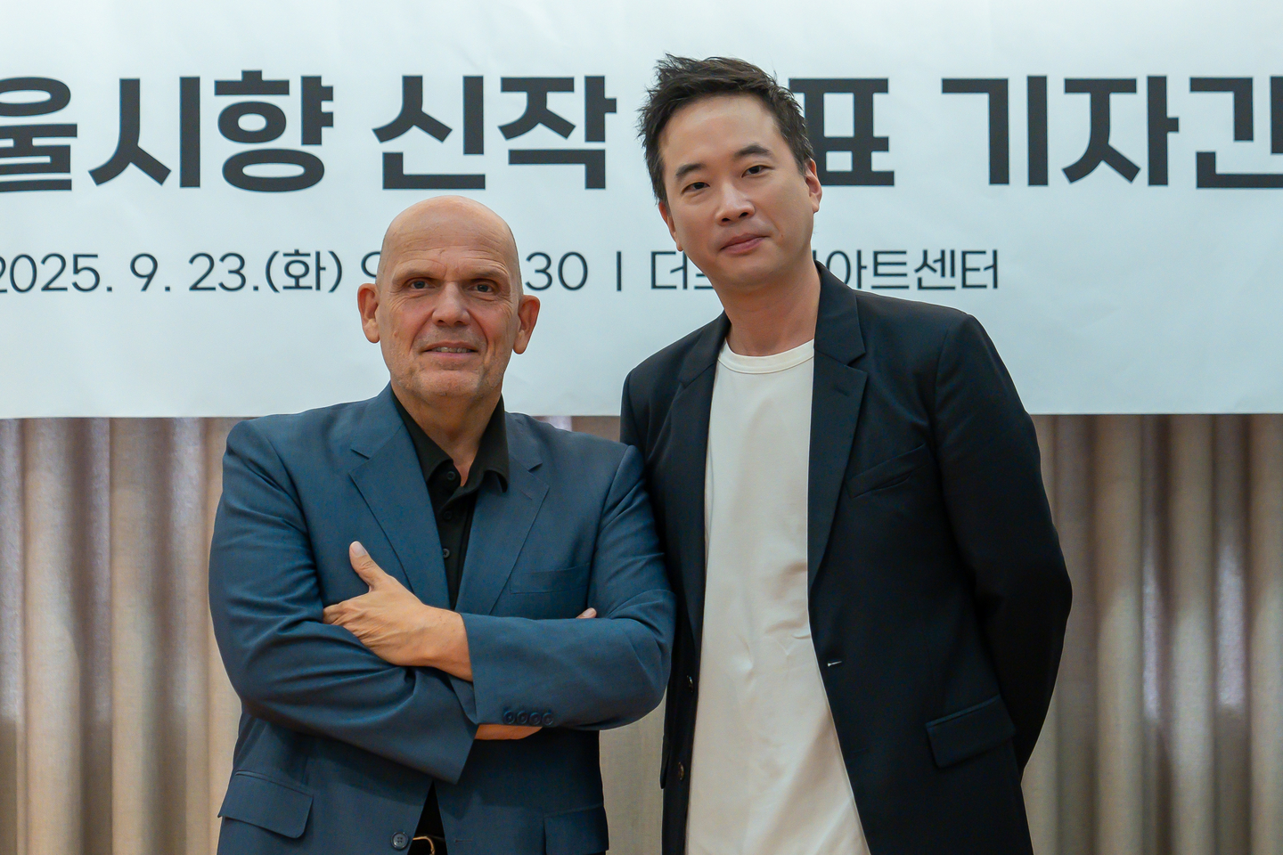 Jaap van Zweden, music director of the Seoul Philharmonic Orchestra, left, and composer Jung Jae-il pose during a press conference in Jongno District, central Seoul, on Sept. 23. [SEOUL PHILHARMONIC ORCHESTRA]