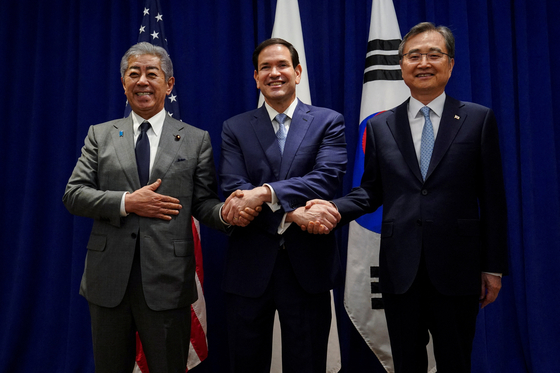 U.S. Secretary of State Marco Rubio, center, shakes hands with Japanese Foreign Minister Iwaya Takeshi, left and Korean Foreign Minister Cho Hyun at the Lotte New York Palace Hotel, on the sidelines of the 80th United Nations General Assembly in New York City on Sept. 22. [REUTERS/YONHAP] 