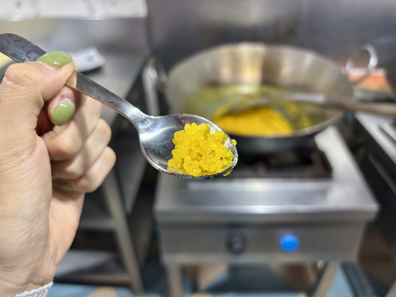 Fried chickpea dough shaped like pearls. They are shaped into spherical desserts called motichoor laddoo. [LEE JIAN]