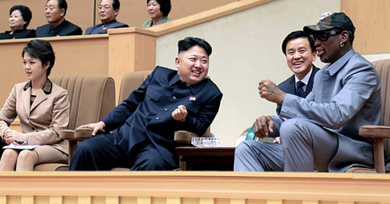 U.S. basketball player Dennis Rodman, far right, talks with North Korean leader Kim Jong-un during the athlete's visit to North Korea in 2014. [RODONG SINMUN]