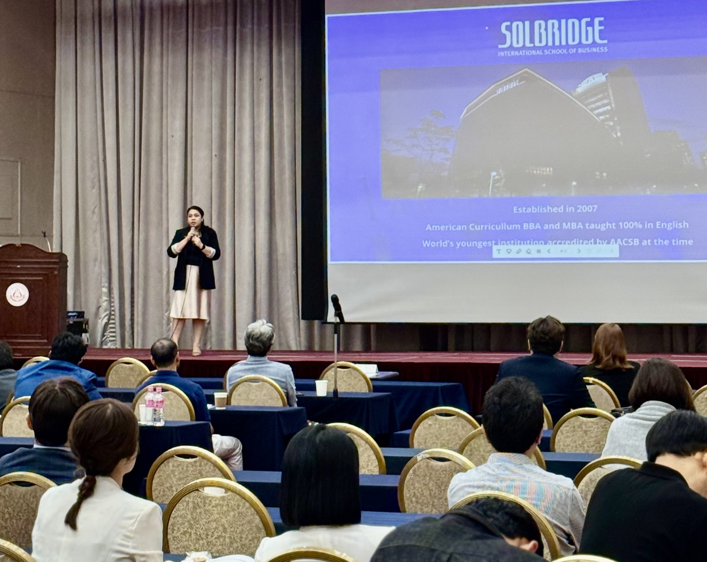 Rezia Usman, the regional director of Woosong University's office of international affairs, delivers a speech at the International Student Fair held at Sejong University on Sept. 25. [OCEAN YANG]