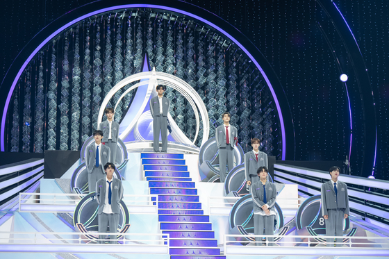The eight final contestants of the K-pop audition program "Boys II Planet" stand on stage during the final episode of the show. [MNET]
