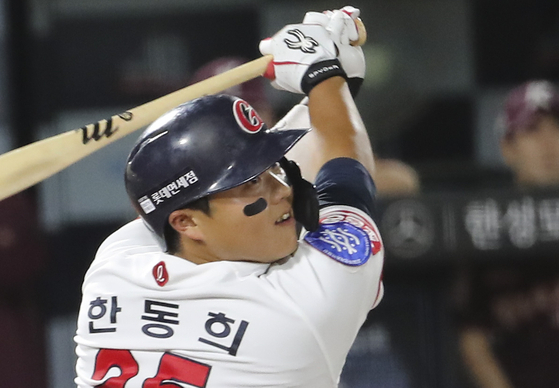 Lotte Giant's Han Dong-hui hits a ball during a game against the Kiwoom Heroes at the Sajik Baseball Stadium in Busan on Sept. 15, 2022. [YONHAP]