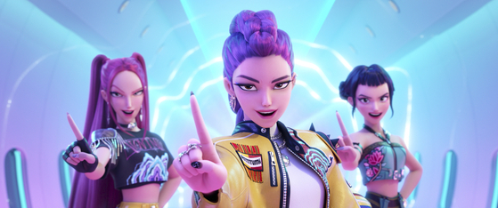 This image released by Netflix shows characters, from left, Mira, Rumi and Zoey, in a scene from animated film ″Kpop Demon Hunters.″ [NETFLIX]