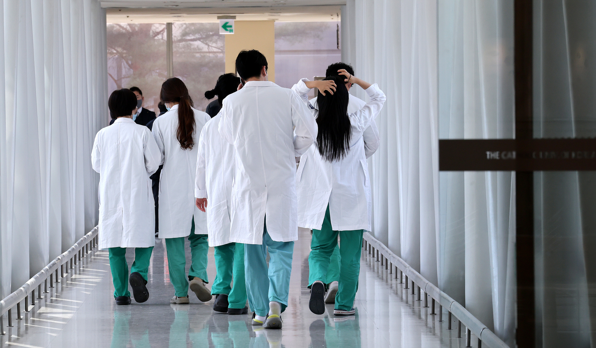 Medical professionals walk in a general hospital in downtown Seoul in March 2024. [NEWS1] 