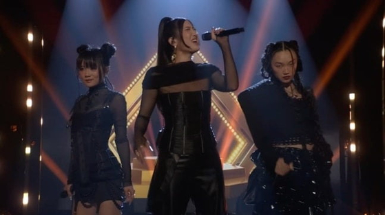 Singers EJAE, Audrey Nuna and Rei Ami perform their hit track ″Golden″ from Netflix's animated film ″KPop Demon Hunters″ during their appearance on ″The Tonight Show Starring Jimmy Fallon,″ which aired on Oct. 7. [SCREEN CAPTURE]