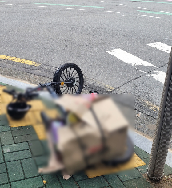 A man in his 70s riding an electric bicycle was killed after being hit by a truck at an intersection in Mandeok-dong, Buk District, Busan, around 11:13 a.m. on Oct. 4. [BUSAN METROPOLITAN POLICE PRECINCT]