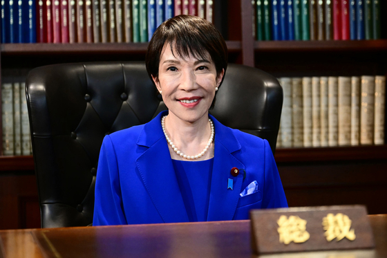 Sanae Takaichi, the newly elected leader of Japan's ruling Liberal Democratic Party (LDP), poses in the party leader's office after the LDP leadership election in Tokyo on Oct. 4. [AP/YONHAP]