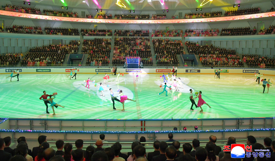 Figure skaters from North Korea, China, Russia and Uzbekistan perform during the closing ceremony of the Pyongyang International Figure Skating Festival on Oct. 8, celebrating the Oct. 10 80th founding anniversary of the ruling Workers Party. [KOREAN CENTRAL NEWS AGENCY] 