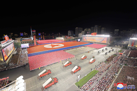 This Sept. 9, 2023, file photo, released by the North's Korean Central News Agency, shows a nighttime military parade marking the North's 75th state founding anniversary taking place in Pyongyang. [KCNA]
