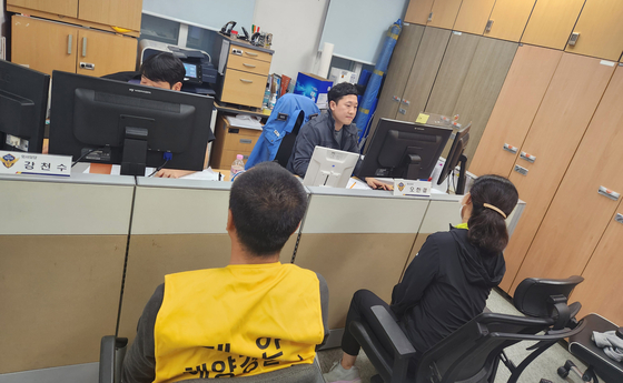 Chinese nationals who were caught attempting to illegally enter Korea through Taean County, South Chungcheong, early on Oct. 6 are questioned at the foreign affairs division of the Taean Coast Guard. [TAEAN COAST GUARD]