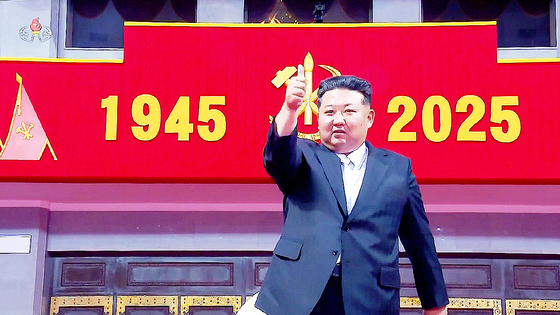 North Korean leader Kim Jong-un raises his thumb in apparent satisfaction after attending the mass gymnastics and art performance “Long Live the Workers’ Party of Korea” at 1st of May Stadium in Pyongyang on Oct. 9, held to celebrate the 80th anniversary of the party’s founding. [KOREAN CENTRAL TV SCREEN CAPTURE] 