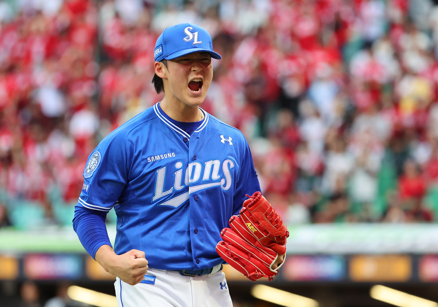 Samsung Lions reliever Lee Ho-sung celebrates after getting out of a bases-loaded jam against the SSG Landers during Game 1 of the first-round series in the Korea Baseball Organization postseason at Incheon SSG Landers Field in Incheon on Oct. 9. [YONHAP]