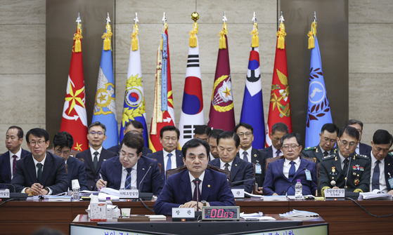 Defense Minister Ahn Gyu-back listens to questions from lawmakers during a parliamentary audit session held at the defense ministry in Seoul on Oct. 13. [JOINT PRESS CORPS]