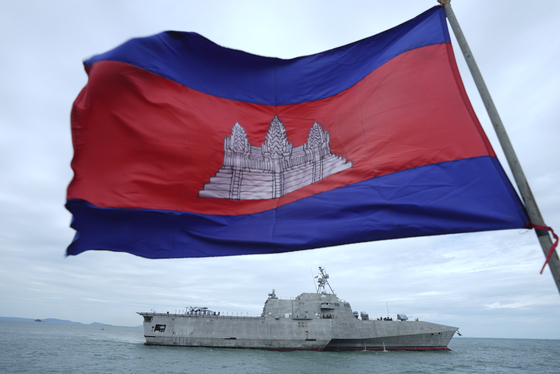 A Cambodian flag flutters as USS Savannah arrives for a port call at Sihanoukville port in Cambodia on Dec. 16, 2024. [AP/YONHAP]