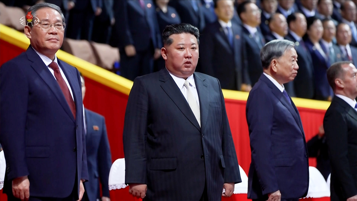 Chinese Premier Li Qiang is seen standing on the right of North Korean leader Kim Jong-un during the celebrations for the 80th anniversary of the founding of the Workers’ Party held in Pyongyang on Oct. 10. [KOREA CENTRAL TV]