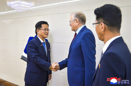 Members from a delegation from North Korea's electric industry ministry are seen attending a global energy forum in Russia on Oct. 14. [KOREAN CENTRAL NEWS AGENCY]