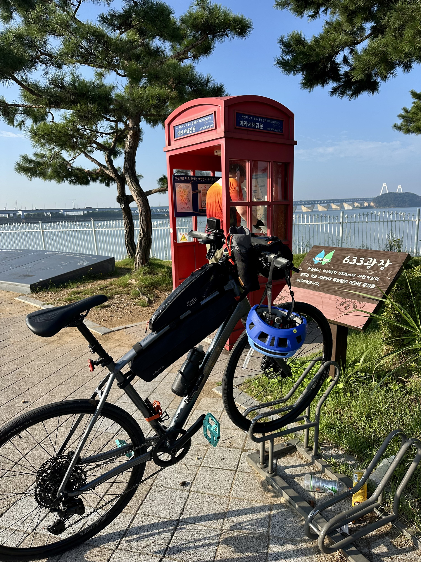 Collecting a stamp at Ara West Sea Lock on the morning of Sept. 27. All stamps on the route are in the same red telephone box-like structures. [JIM BULLEY]