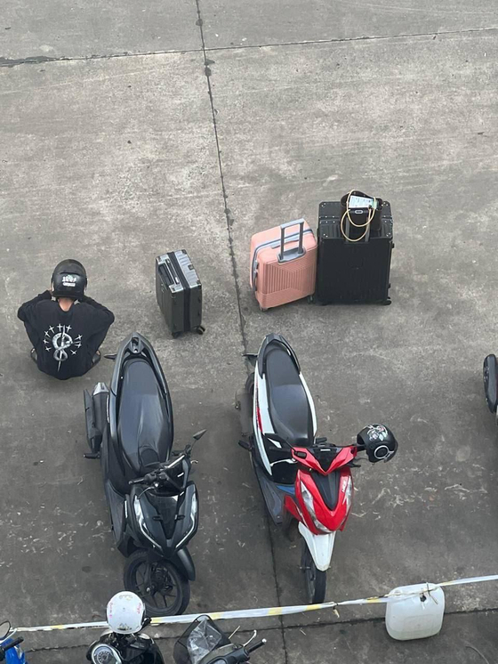 A photo posted on Telegram shows motorcycles parked in a neighborhood in Sihanoukville, Cambodia [SCREEN CAPTURE]