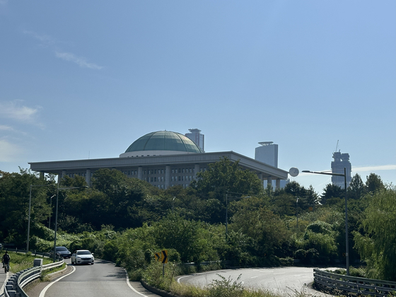 The National Assembly in Yeouido, western Seoul pictured from the Hangang Bicycle Path on Sept. 27. [JIM BULLEY]