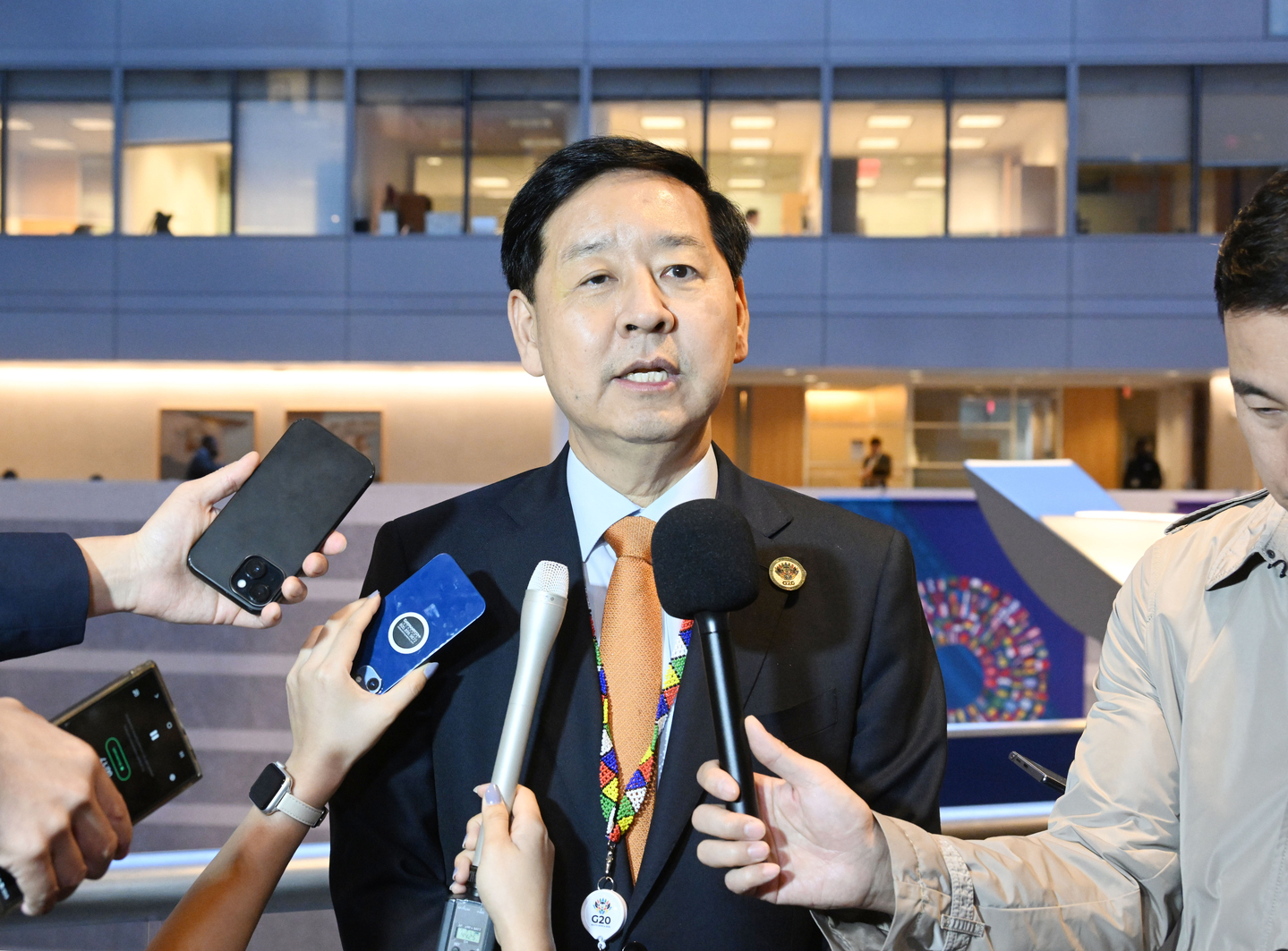 Deputy Prime Minister and Finance Minister Koo Yun-cheol speaks to reporters in Washington on Oct. 16. [YONHAP] 