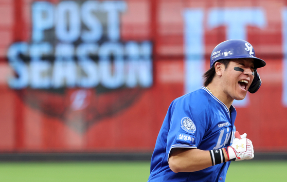 Kang Min-ho of the Samsung Lions celebrates after hitting a two-run home run against the Hanwha Eagles during Game 2 of the second-round series in the KBO postseason at Daejeon Hanwha Life Ballpark in the central city of Daejeon on Oct. 19, 2025. [YONHAP]