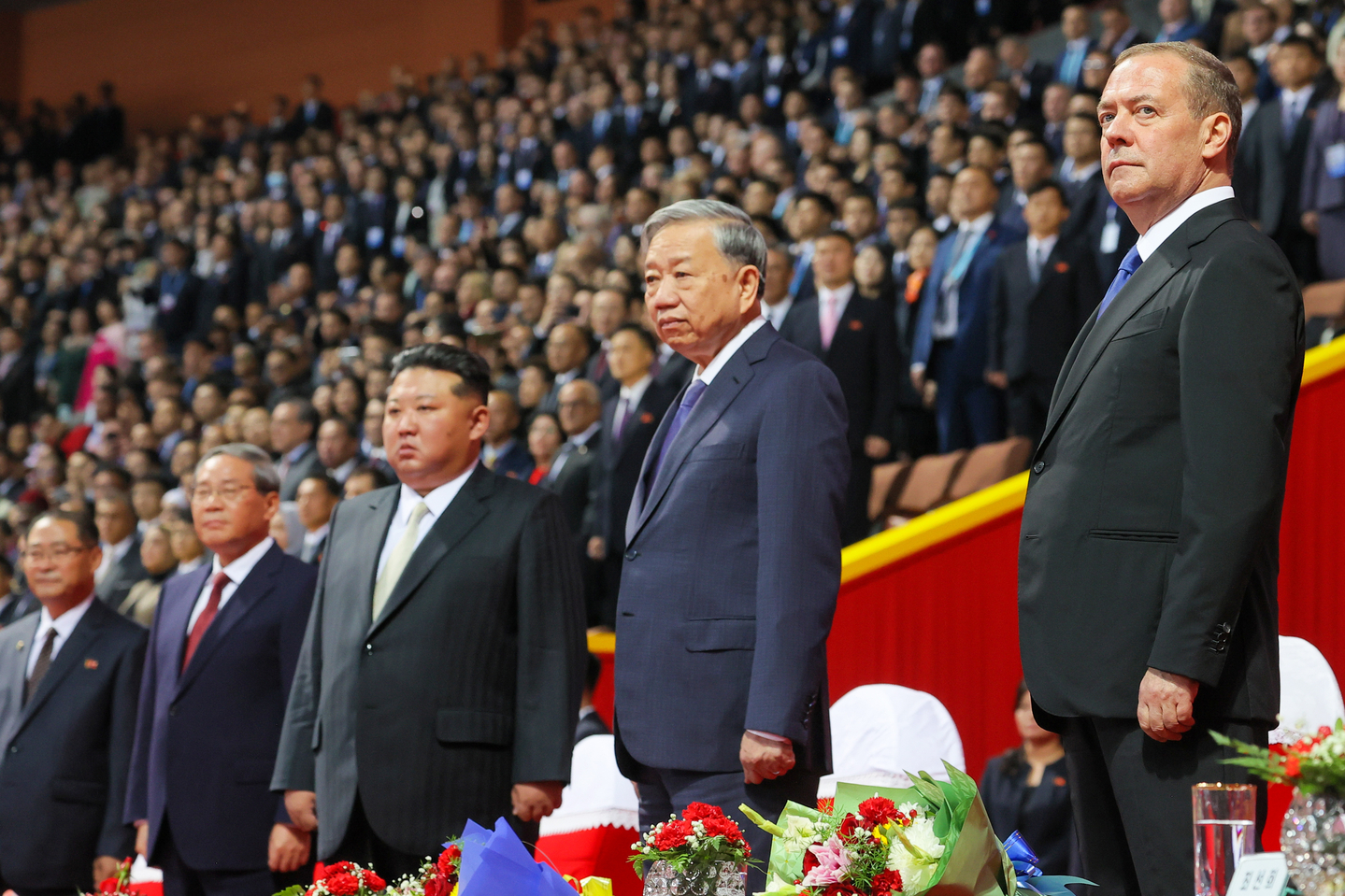 From right: Russian Security Council Deputy Chairman Dmitry Medvedev, General Secretary of the Communist Party of Vietnam To Lam, North Korean leader Kim Jong-un and Chinese Premier Li Qiang attend an evening event at the Rungrado Stadium in Pyongyang to mark the 80th anniversary of the founding of the North's ruling Workers' Party. [TASS/YONHAP]