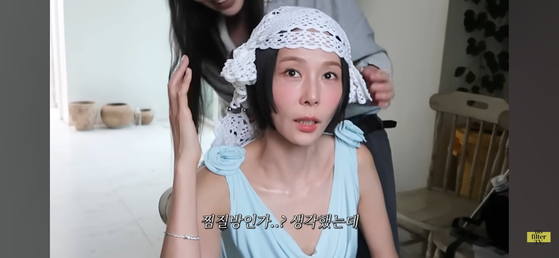 The video of entertainer Kim Na-young and the wedding to her new husband, singer and painter My Q, uploaded on YouTube on Oct. 19 [SCREEN CAPTURE]