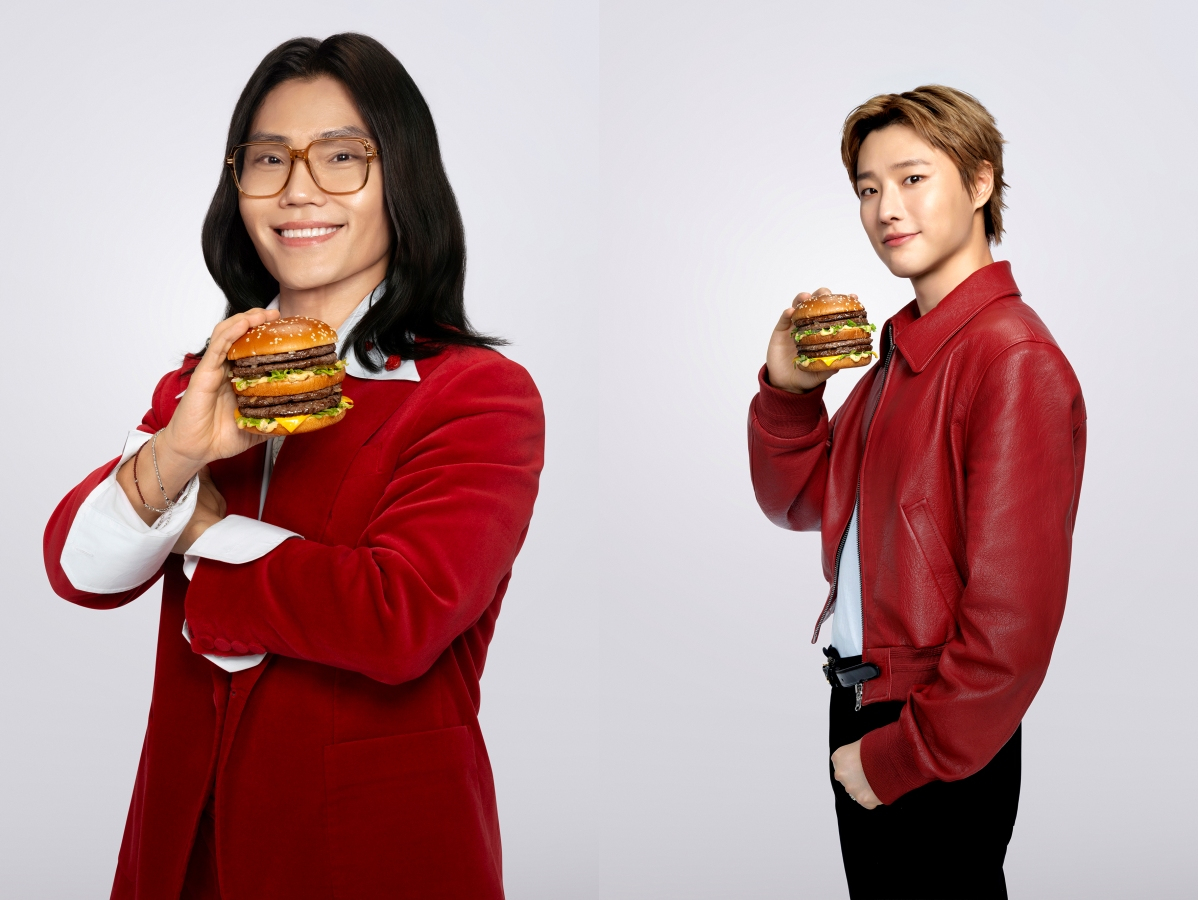 Singers Kim Bum-soo, left, and Woodz, the new campaign model for McDonald's Korea [MCDONALD'S KOREA]