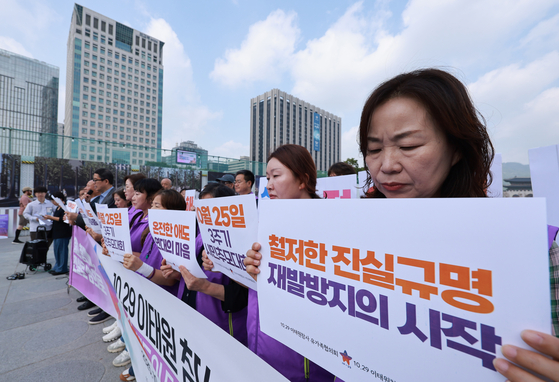 The Itaewon Disaster Bereaved Families Council holds a press conference at Gwanghwamun Square in central Seoul on Oct. 1. [YONHAP]