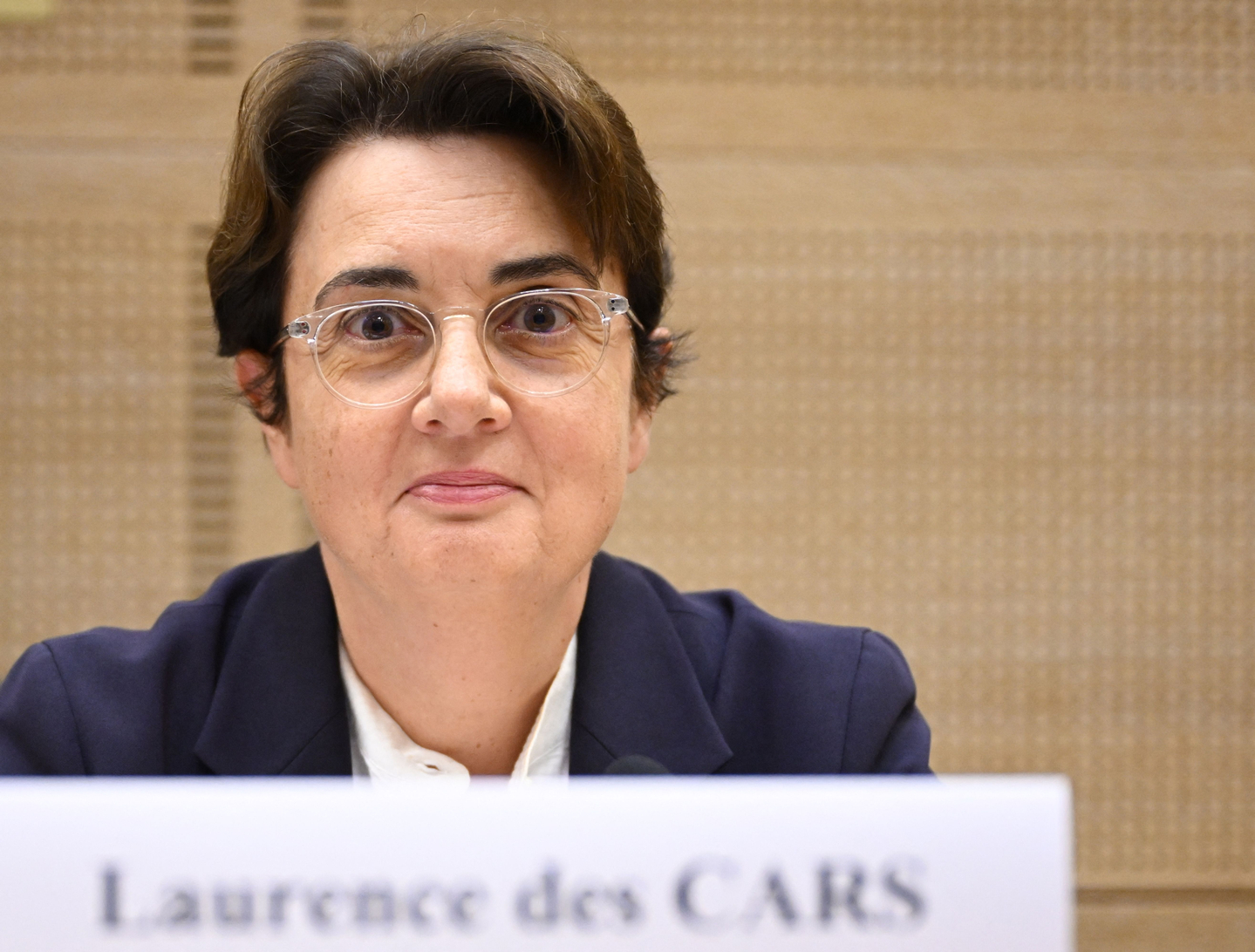 President of the Louvre Museum Laurence des Cars looks on prior to the start of a hearing before the Senate's culture committee at the French Senate in Paris on Oct. 22. Laurence des Cars has not made any public statement since the theft on Oct. 19. Des Cars, who became the first woman to run the Louvre in 2021, is expected to be questioned about security at the Apollo Gallery, which houses the royal collection of gems. The museum on Oct. 21 hit back at criticism that the display cases protecting the stolen jewelry were fragile, saying they were installed in 2019 and ″represented a considerable improvement in terms of security.″ [AFP/YONHAP]