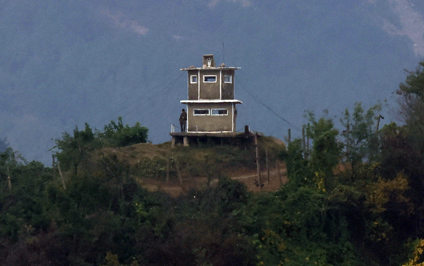 A North Korean soldier stands outside a guard post near the border in Paju, Gyeonggi, on Oct. 16, 2024. [NEWS1] 