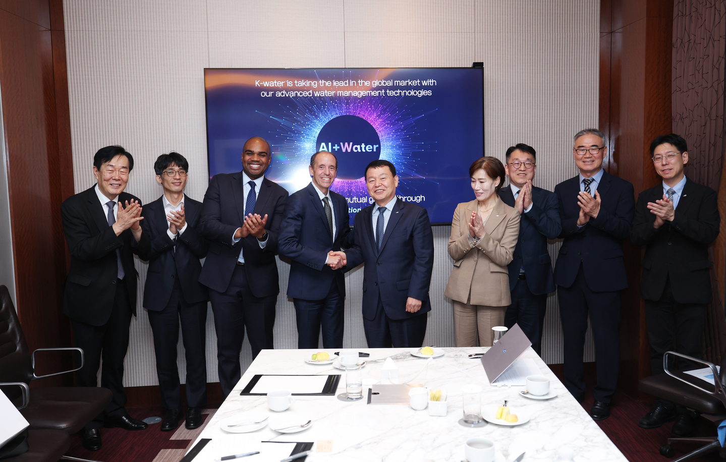 Yun Seog-dae, CEO of the Korea Water Resources Corporation, or K-water, fifth from left, meets with Chris Lehane, vice president of global policy at OpenAI, fourth from left, in central Seoul on Oct. 23 to discuss collaboration on AI-powered innovations in water management. [K-WATER]