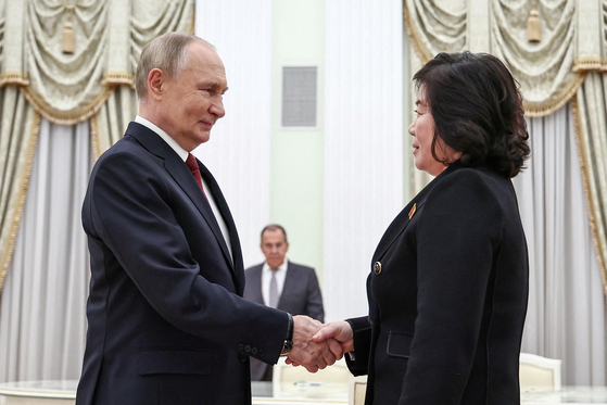 Russian President Vladimir Putin, left, shakes hands with North Korean Foreign Minister Choe Son-hui during a meeting in Moscow on Nov. 4, 2024. [REUTERS/YONHAP]