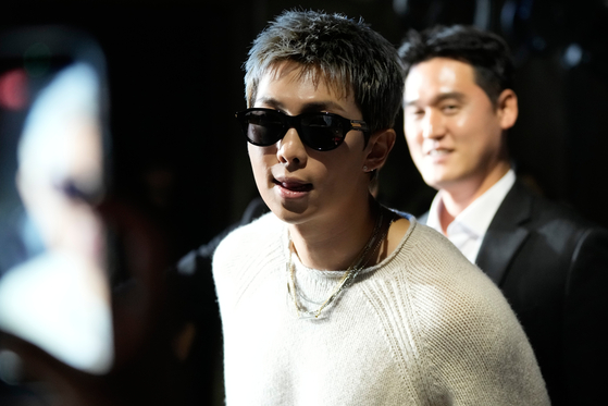 RM of BTS arrives at the Bottega Veneta women's Spring-Summer 2026 fashion show, in Milan, Italy on Sept. 27. [AP/YONHAP]