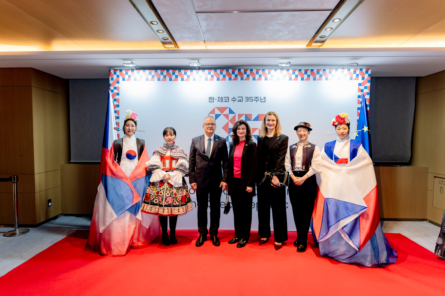 Czech Ambassador to Korea Ivan Jančárek, third from left, his spouse Andrea Jančárková, fourth from left, and Czech Deputy Head of Mission Jana Cimbolincová, fifth from left, pose for a photo at a reception to celebrate Independent Czechoslovak State Day, which marks the founding of Czechoslovakia in 1918, held on Monday evening at The Ambassador Seoul - A Pullman Hotel in Jung District, central Seoul. [EMBASSY OF THE CZECH REPUBLIC TO KOREA]