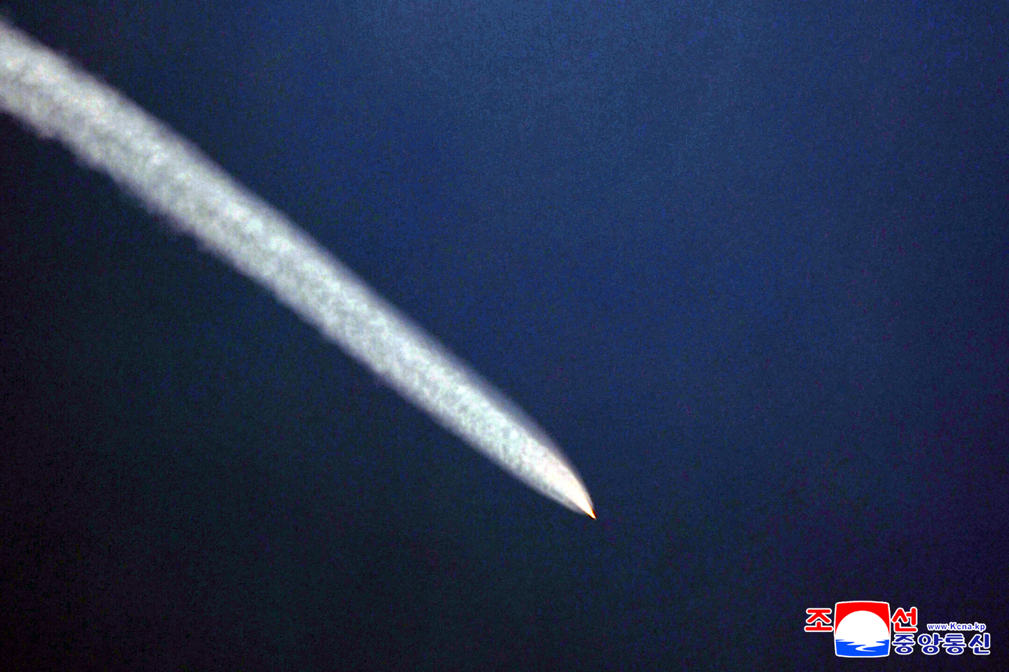 This photo from the Korean Central News Agency on Oct. 23 shows North Korea's missile launch the previous day. The agency said two hypersonic projectiles were launched from the Ryokpho District in Pyongyang in a northeast direction before hitting a target on Kwesang Peak in Orang County, North Hamgyong Province. [KCNA]