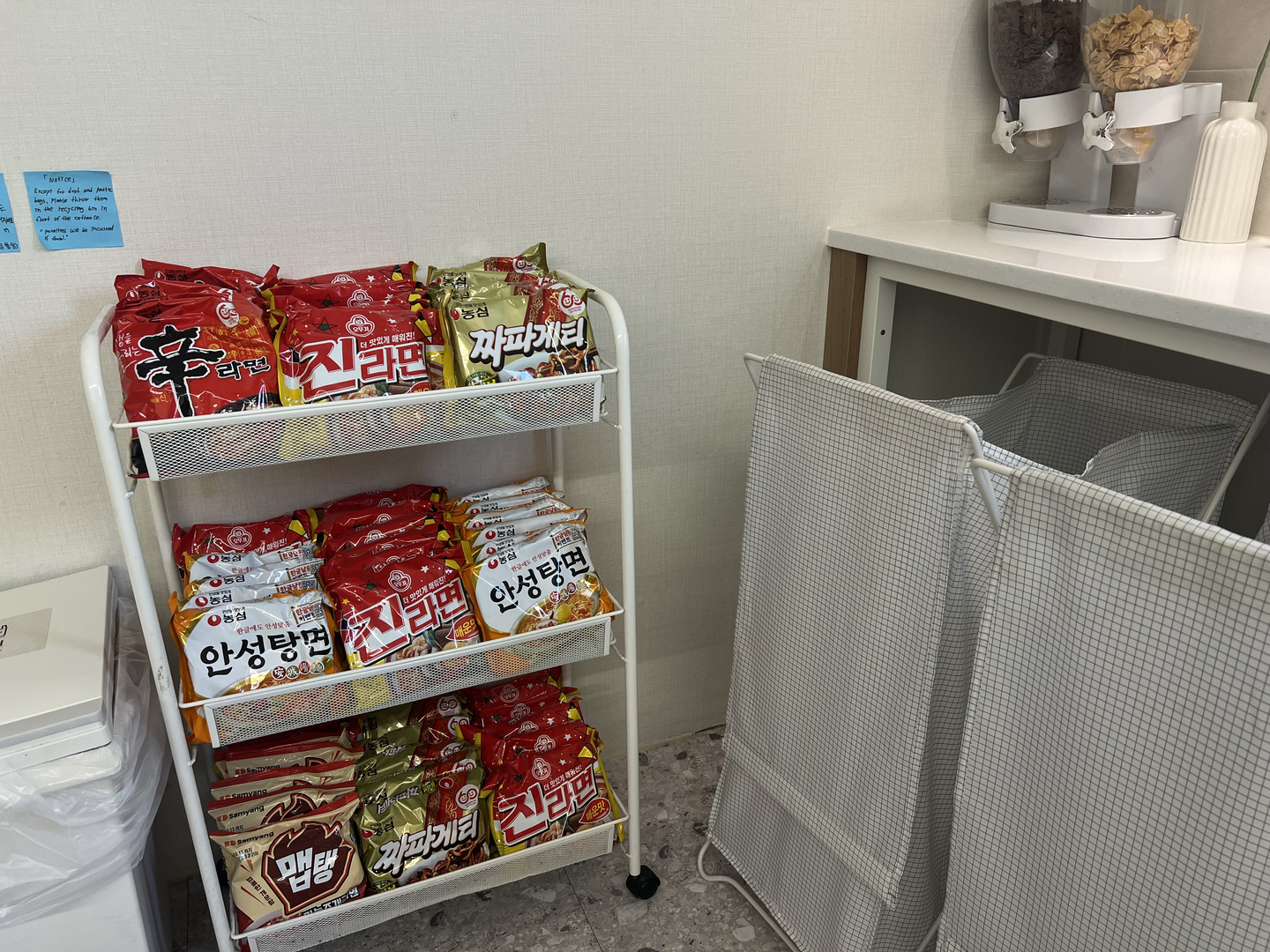 Instant noodles products are placed on shelves at the shared kitchen of the gosiwon (small, affordable single-room housing) building where Lydia Rouka stays. [LYDIA ROUKA]