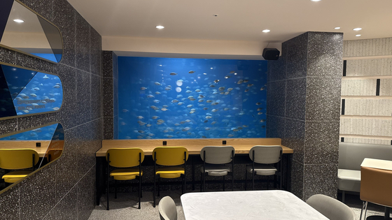 Another section shows fishes swimming [WOO JI-WON]