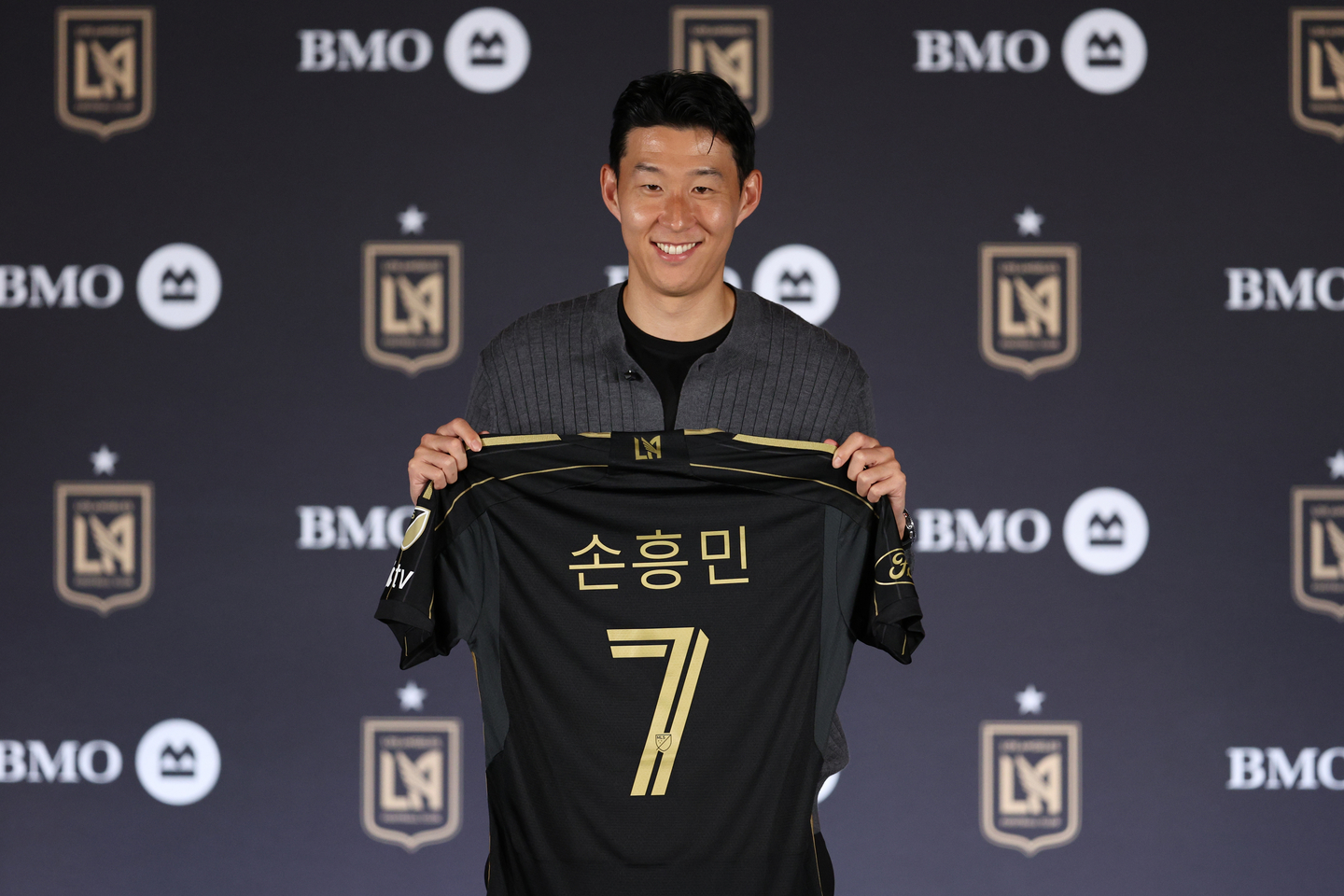 Son Heung-min holds his jersey for a photo during a press conference with Los Angeles FC at BMO Stadium in Los Angeles on Aug. 6. [LOS ANGELES FC]