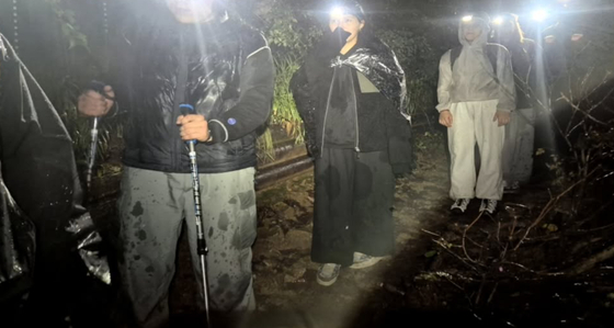 Russian hikers are rescued after collapsing from exhaustion in Seoraksan National Park on Oct. 17. [SEORAKSAN NATIONAL PARK OFFICE] 