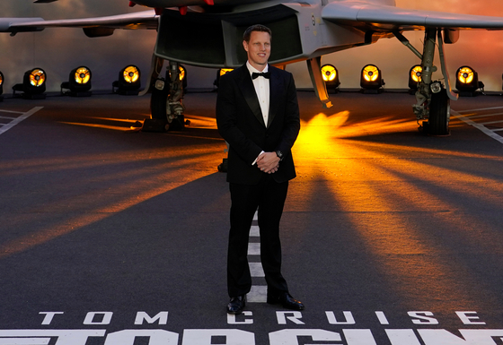 Producer David Ellison poses for the media during the "Top Gun: Maverick" (2022) U.K. premiere at a central London cinema, on May 19, 2022. [AP/YONHAP]
