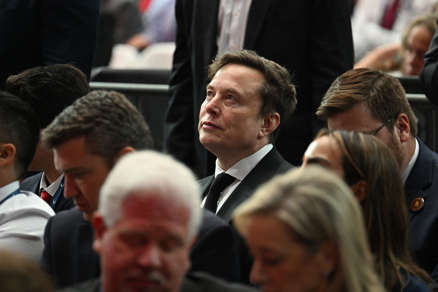 Elon Musk attends the memorial service for Charlie Kirk at State Farm Stadium in Glendale, Ariz., Sept. 21, 2025. Musk on Monday, Oct. 27, 2025, unveiled his own version of Wikipedia, the crowdsourced online encyclopedia, with entries edited by xAI, his artificial intelligence company. The new project, Grokipedia, would “purge out the propaganda” flooding Wikipedia, Musk claimed in a post on his social media site, X. (Kenny Holston/The New York Times) 