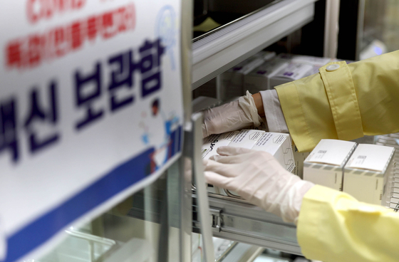 An employee checks the stock of Covid-19 and flu vaccines at the Buk District Public Health Center in Gwangju on Oct. 29. [GWANGJU BUK DISTRICT OFFICE]