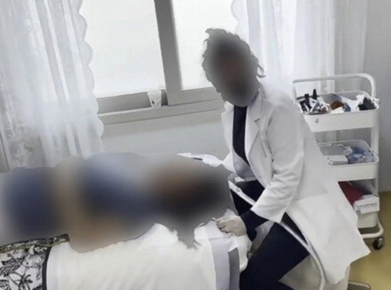 A Chinese woman illegally performs dental procedures in Jeju. [JEJU PROVICINAL POLICE ]